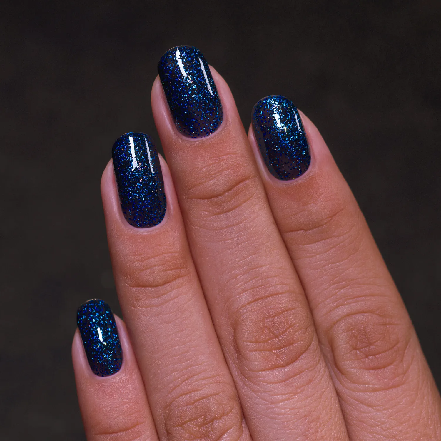 ILNP Trapped Lured nagellack svart metallic