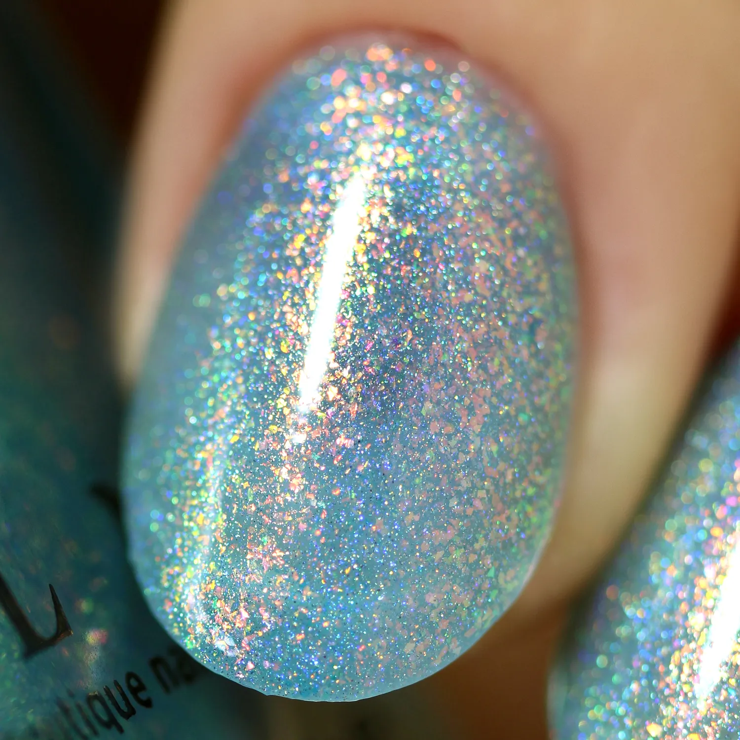 ILNP Skate Date nagellack teal jelly med orange-grönt skimmer