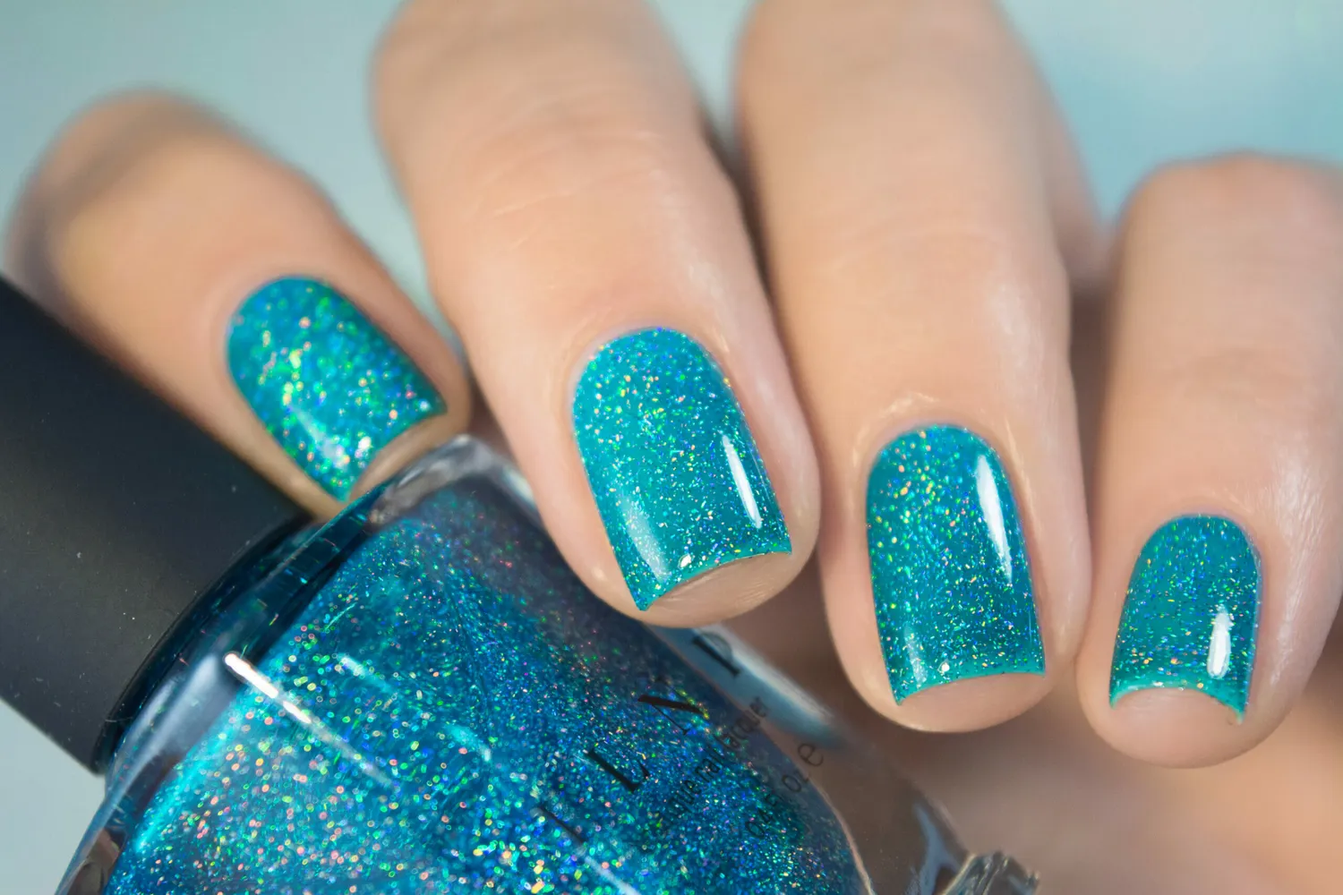 ILNP Surfboard nagellack turkos holografisk