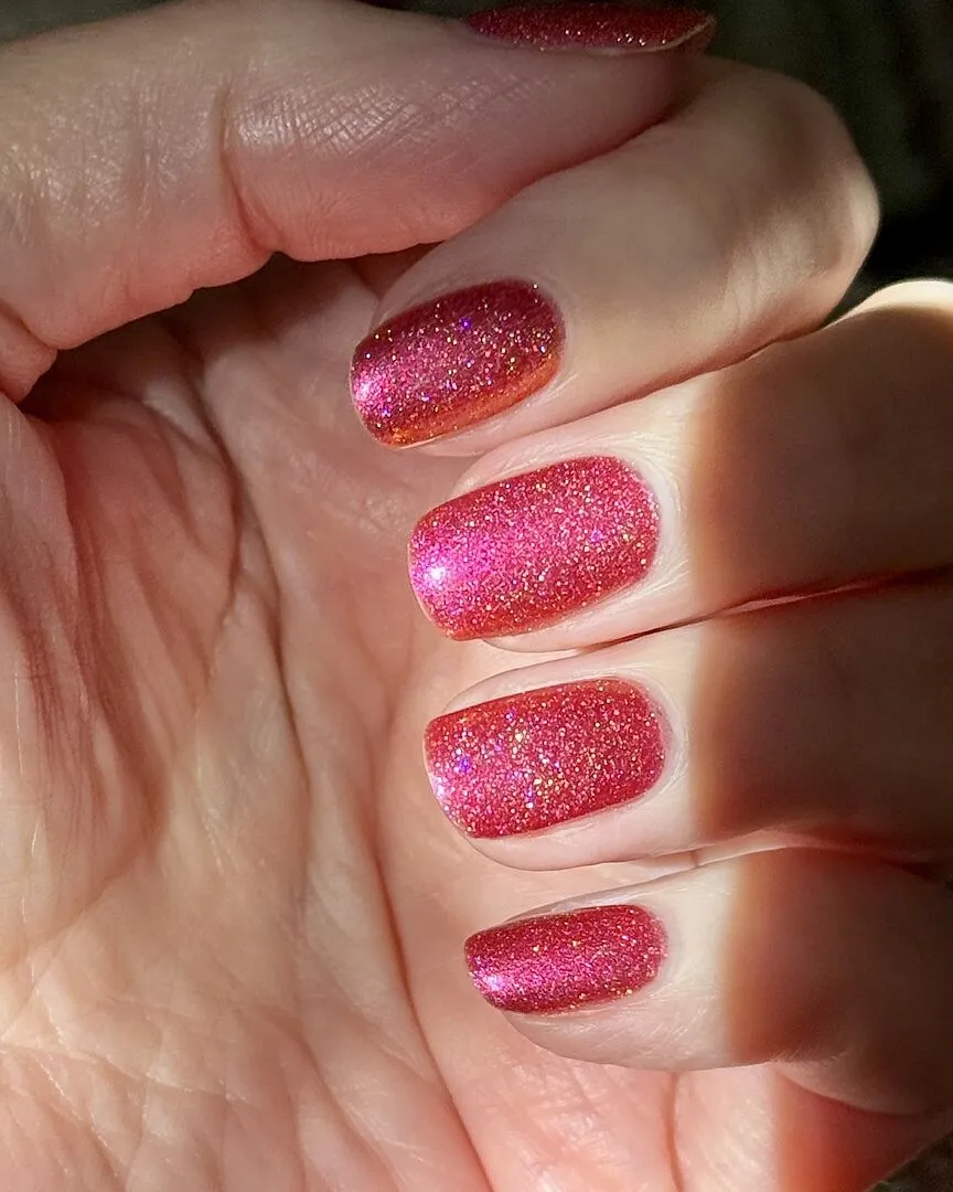 Cirque Colors Ringleader nagellack röd-orange holografisk