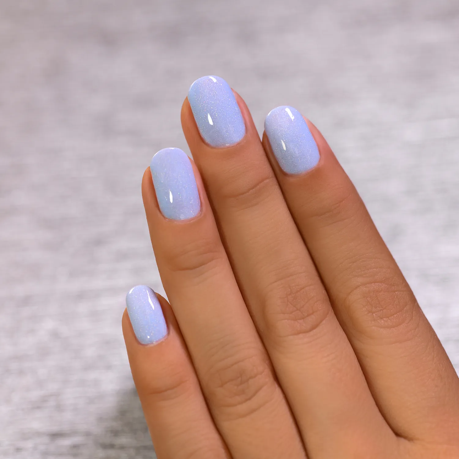 ILNP At Sea Carried Away nagellack duvblå jelly holo