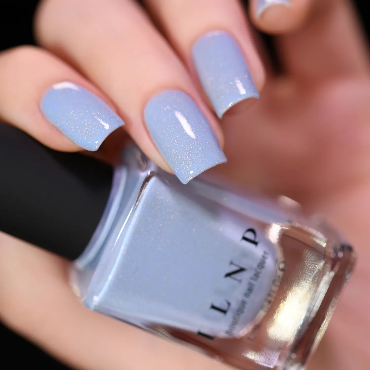 ILNP At Sea Carried Away nagellack duvblå jelly holo