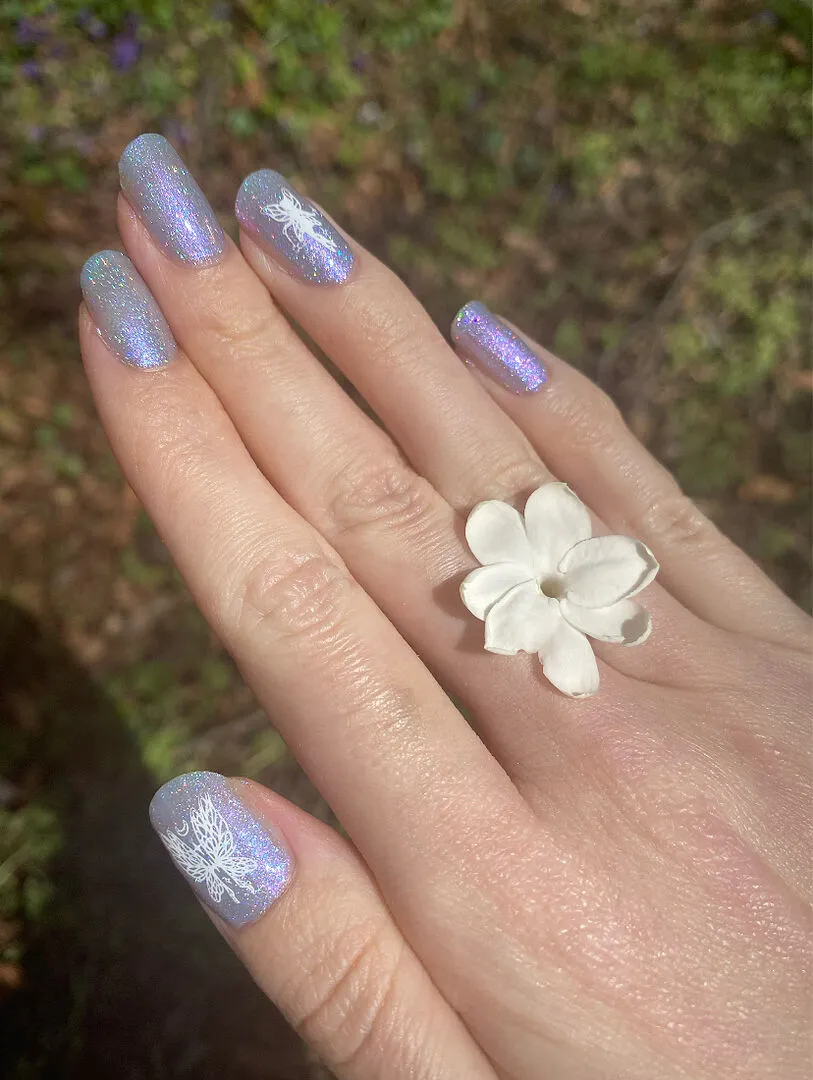 Cirque Colors Spoonful of Sugar nagellack blå holo shimmer