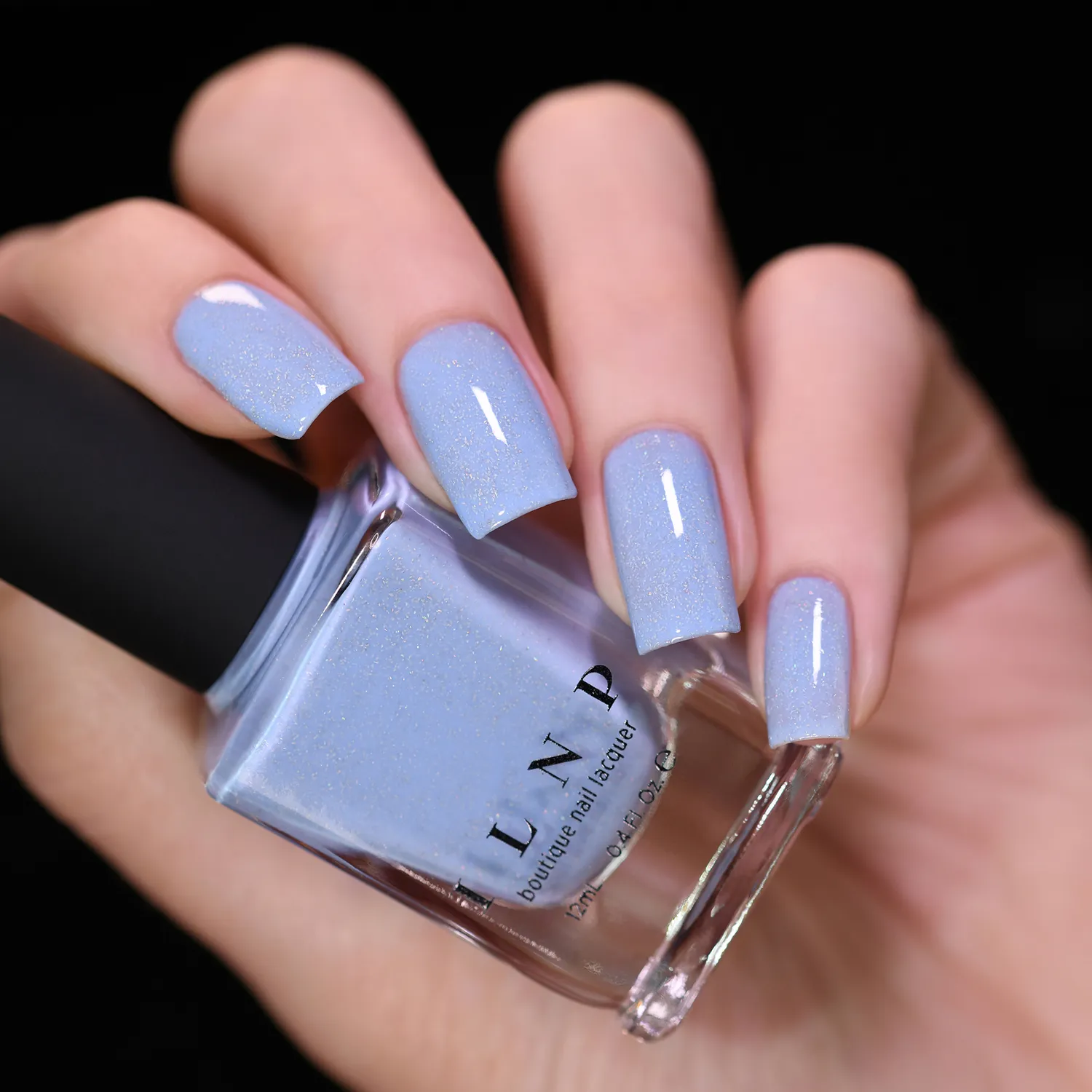 ILNP At Sea Carried Away nagellack duvblå jelly holo