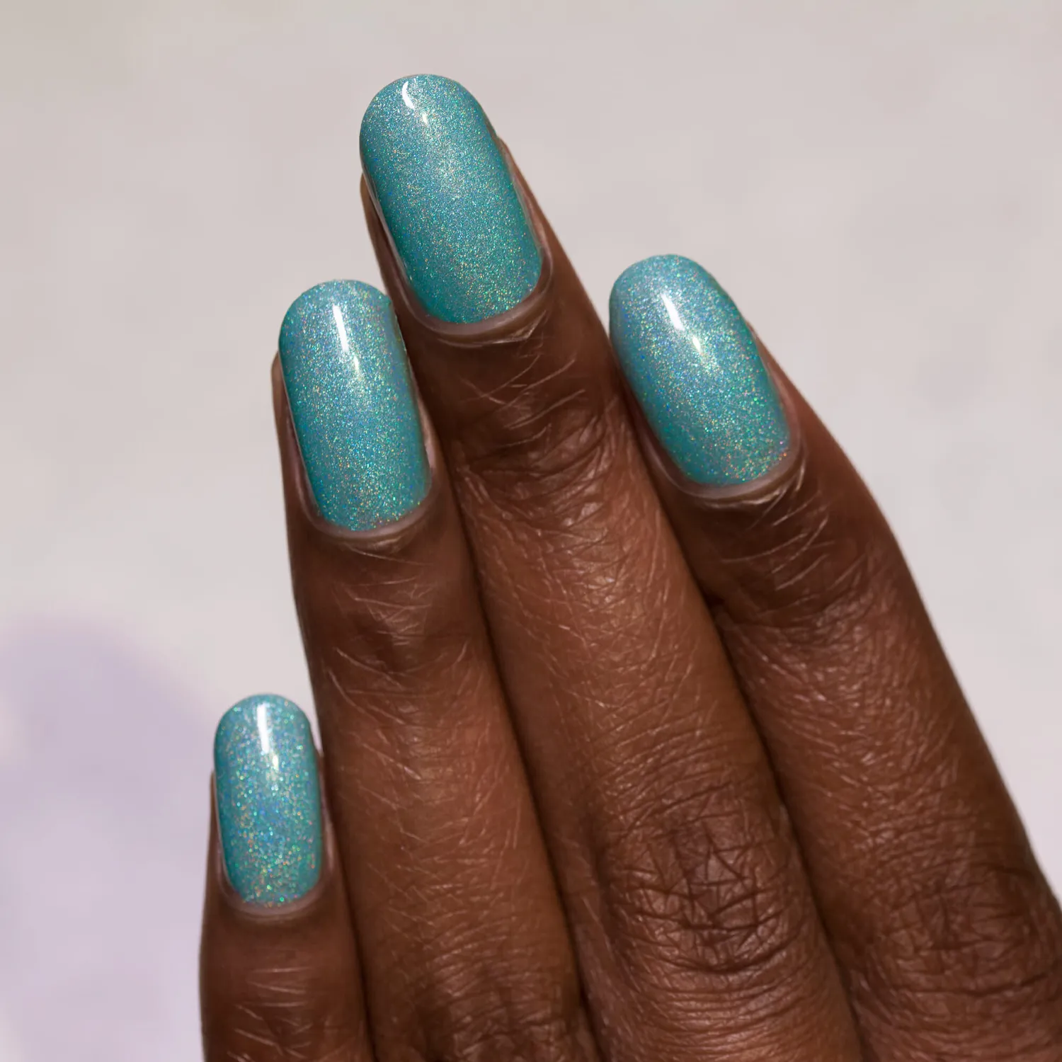 ILNP Music Box nagellack mjuk teal holo