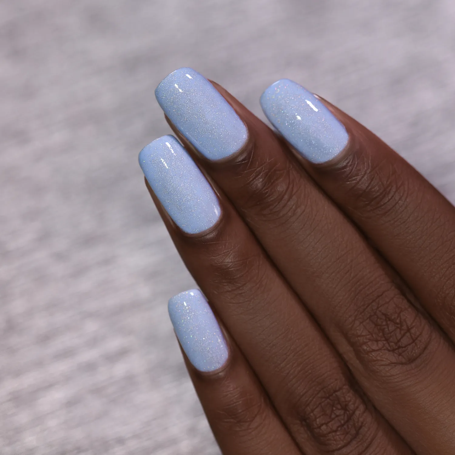 ILNP At Sea Carried Away nagellack duvblå jelly holo