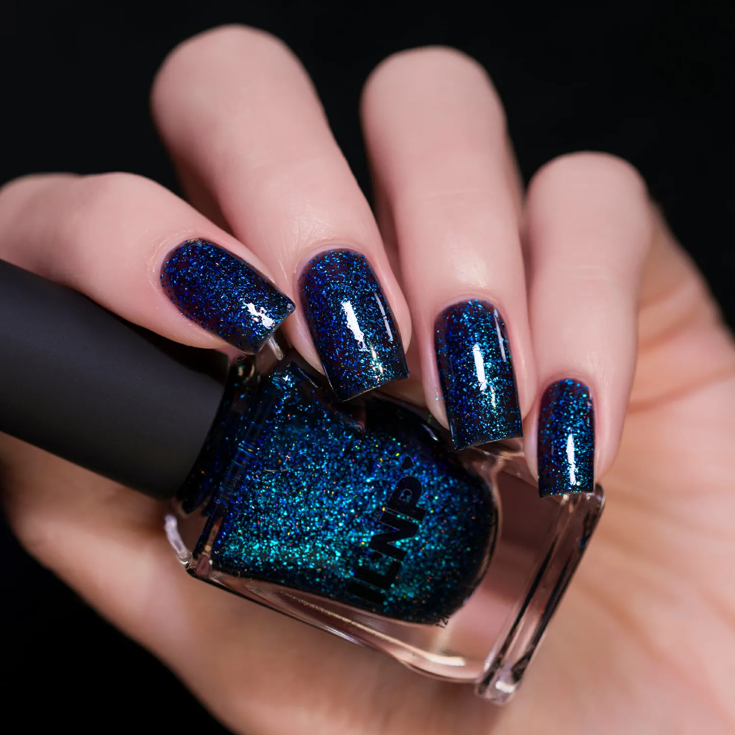 ILNP Trapped Lured nagellack svart metallic
