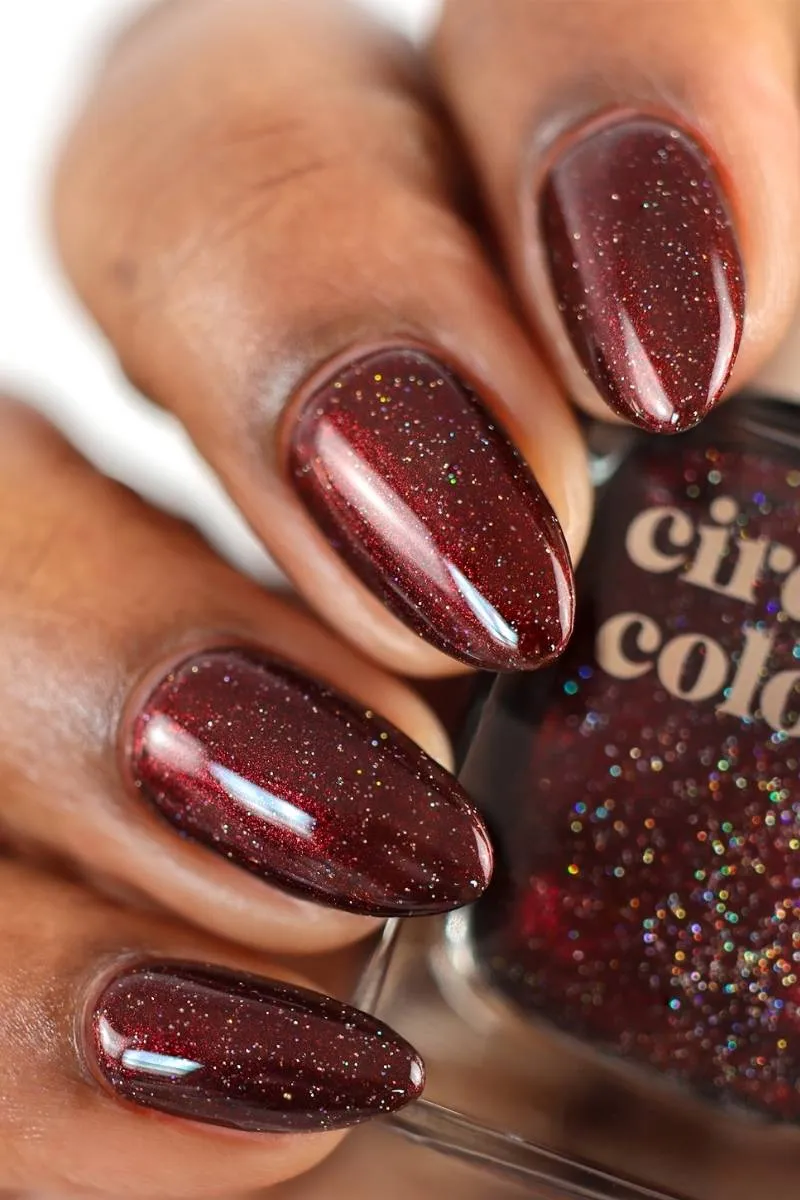 Cirque Colors Black Widow nagellack svart rött skimmer