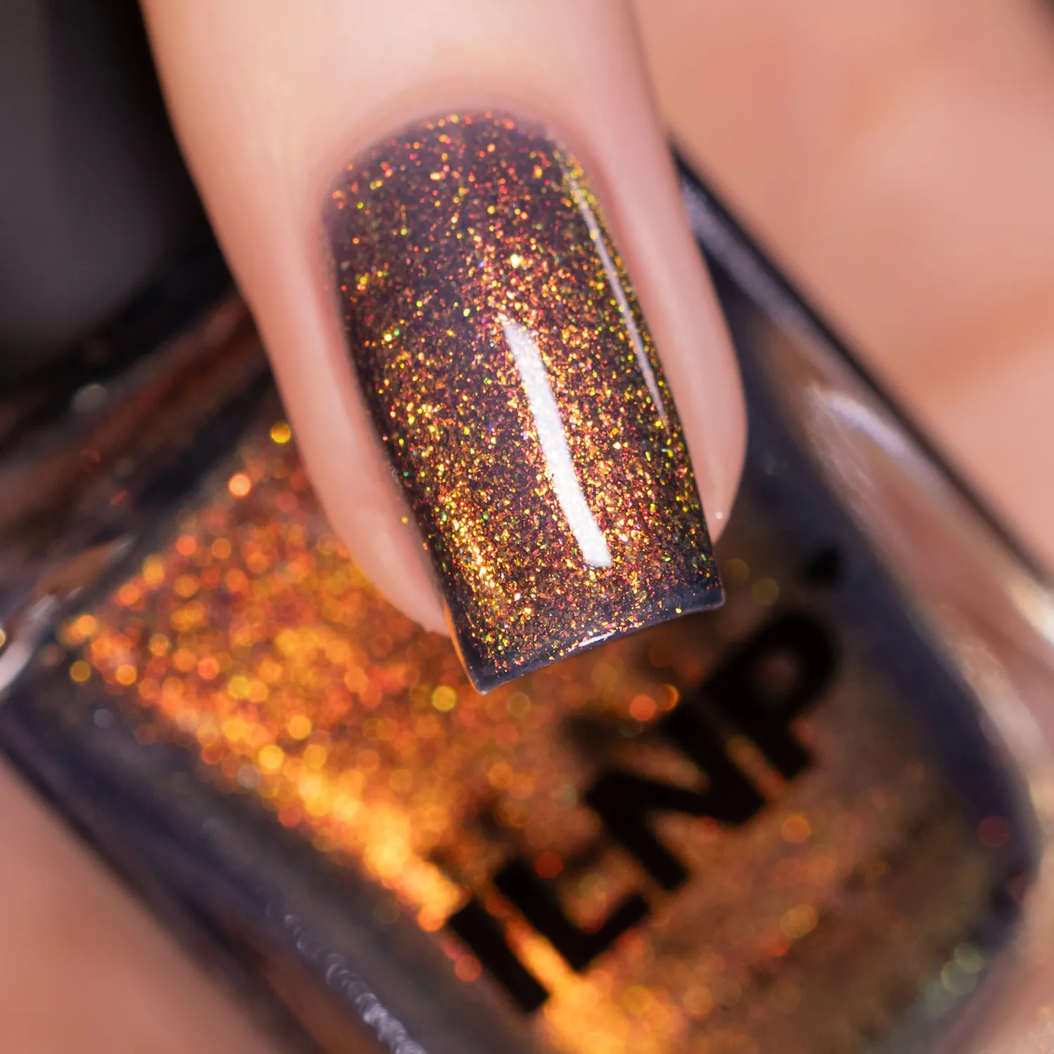 ILNP Pyro nagellack mörkblå orange skimmer