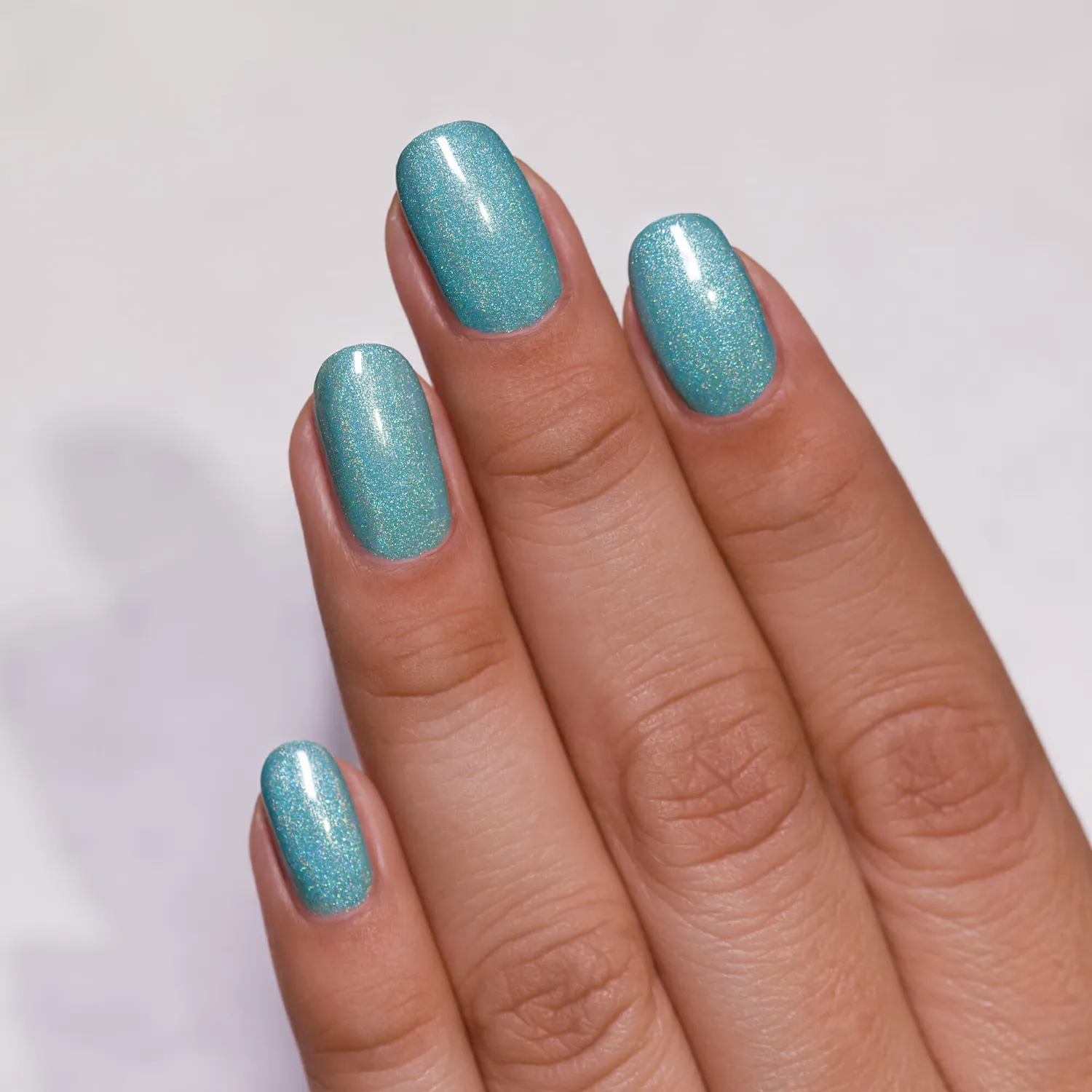 ILNP Music Box nagellack mjuk teal holo