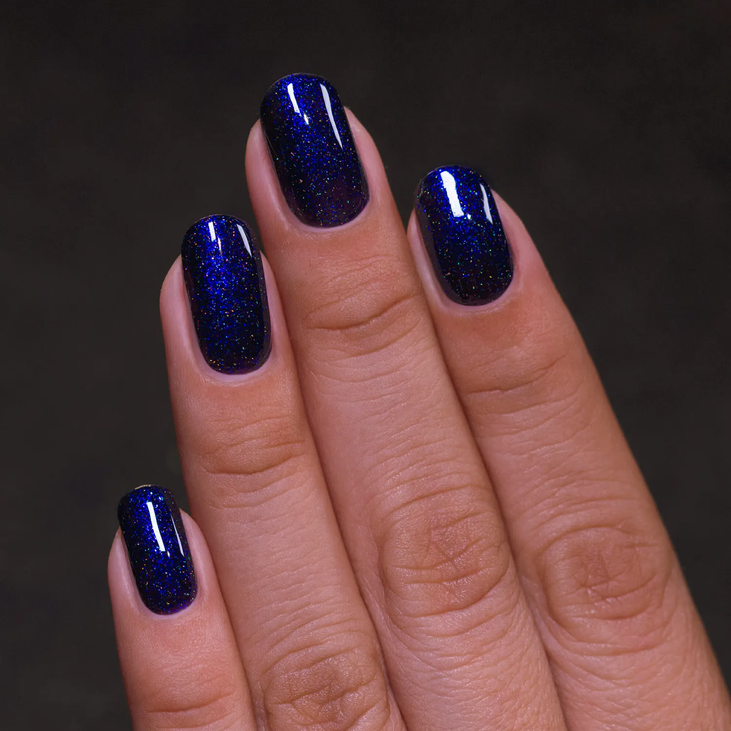 ILNP Trapped Nocturnal nagellack svart med blått skimmer