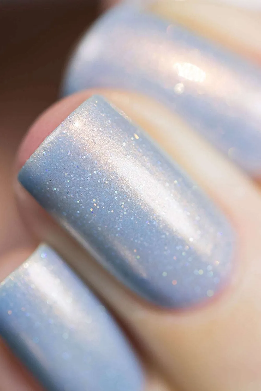 Cirque Colors Hygge nagellack sheer ljusblå kopparskimmer