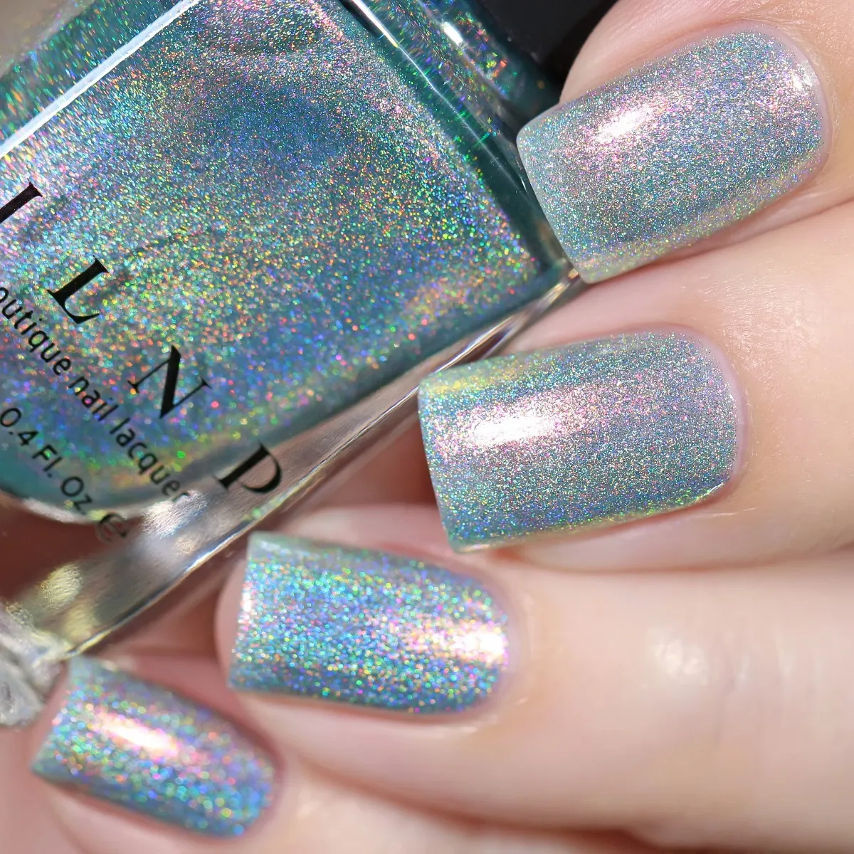 ILNP Summer Lovin nagellack pastellteal med rosa holo