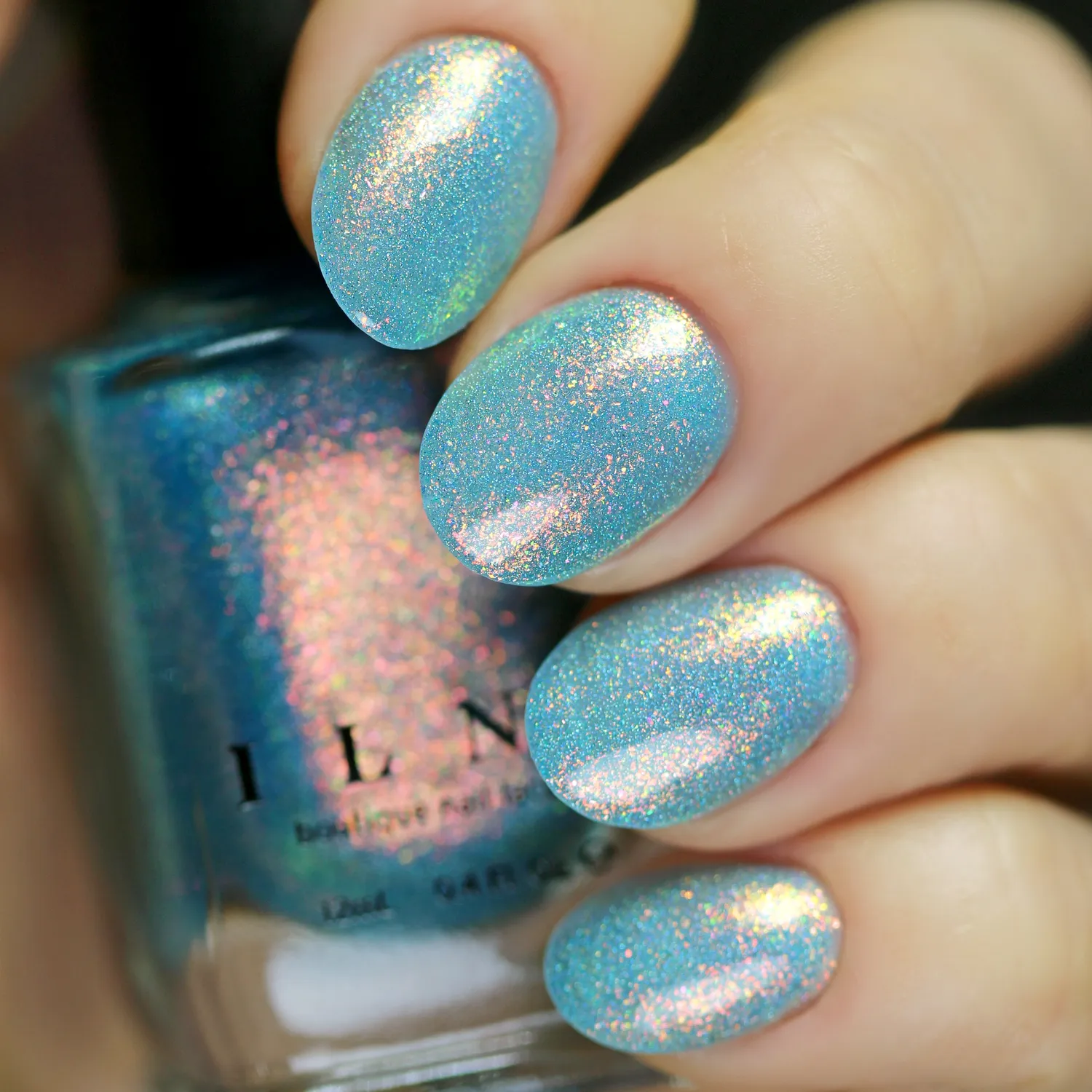 ILNP Skate Date nagellack teal jelly med orange-grönt skimmer