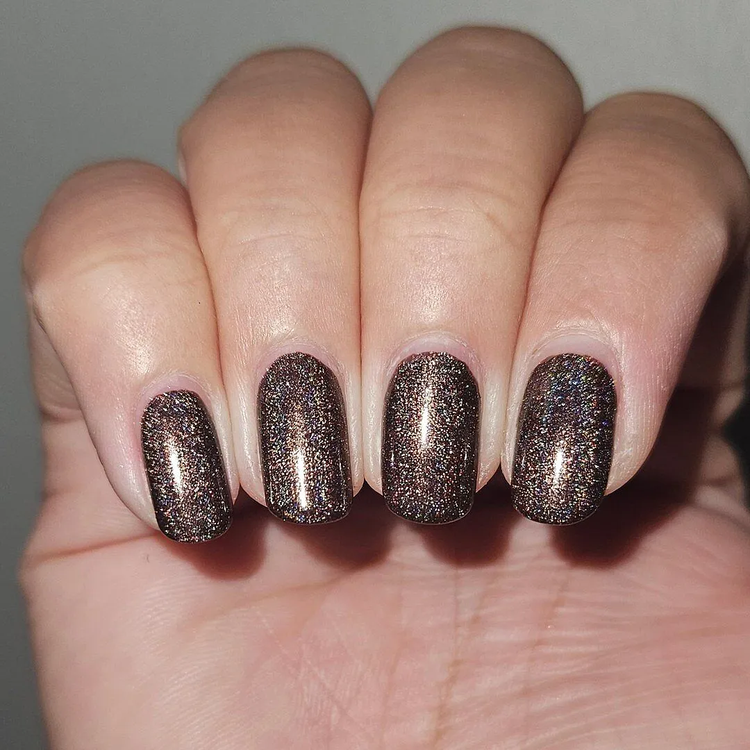 Cirque Colors Pony Up nagellack mörkbrun holografisk