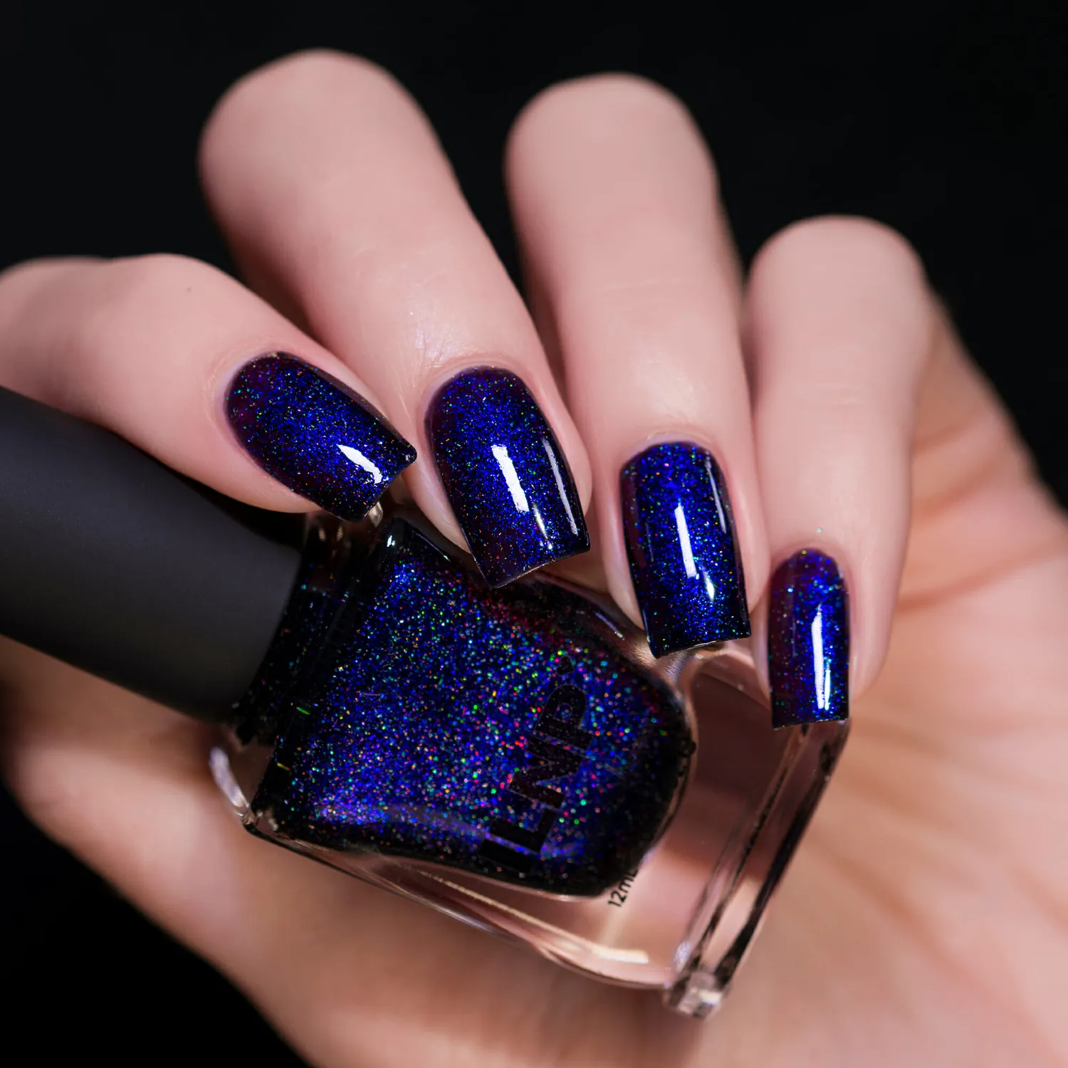 ILNP Trapped Nocturnal nagellack svart med blått skimmer