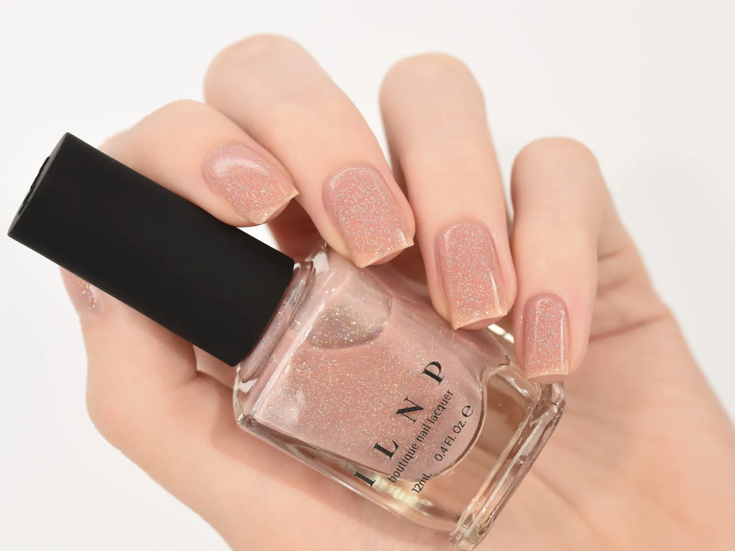 ILNP Sandy Baby nagellack persikobeige holografisk