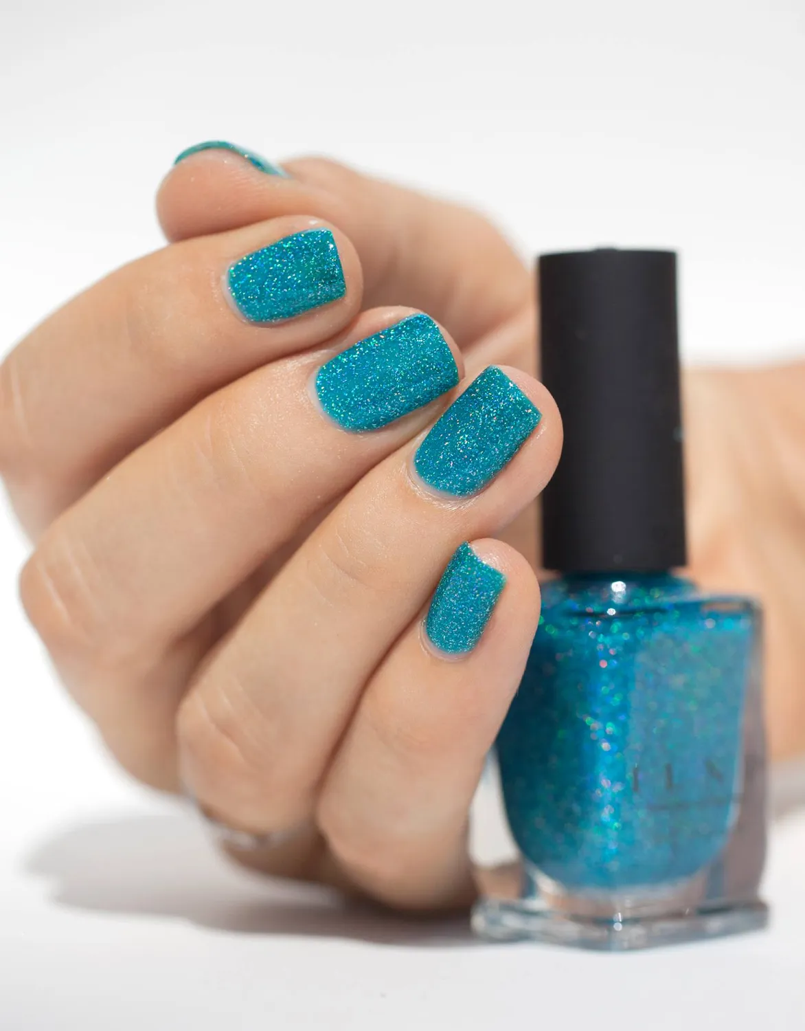 ILNP Surfboard nagellack turkos holografisk