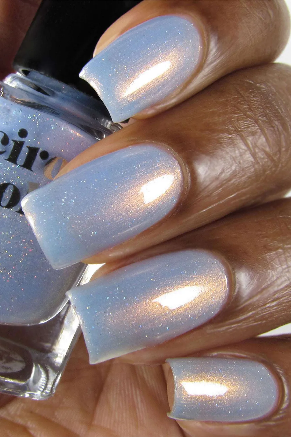 Cirque Colors Hygge nagellack sheer ljusblå kopparskimmer