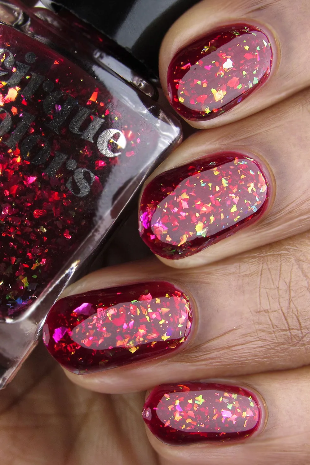 Cirque Colors Snozzberry nagellack jelly vinröd