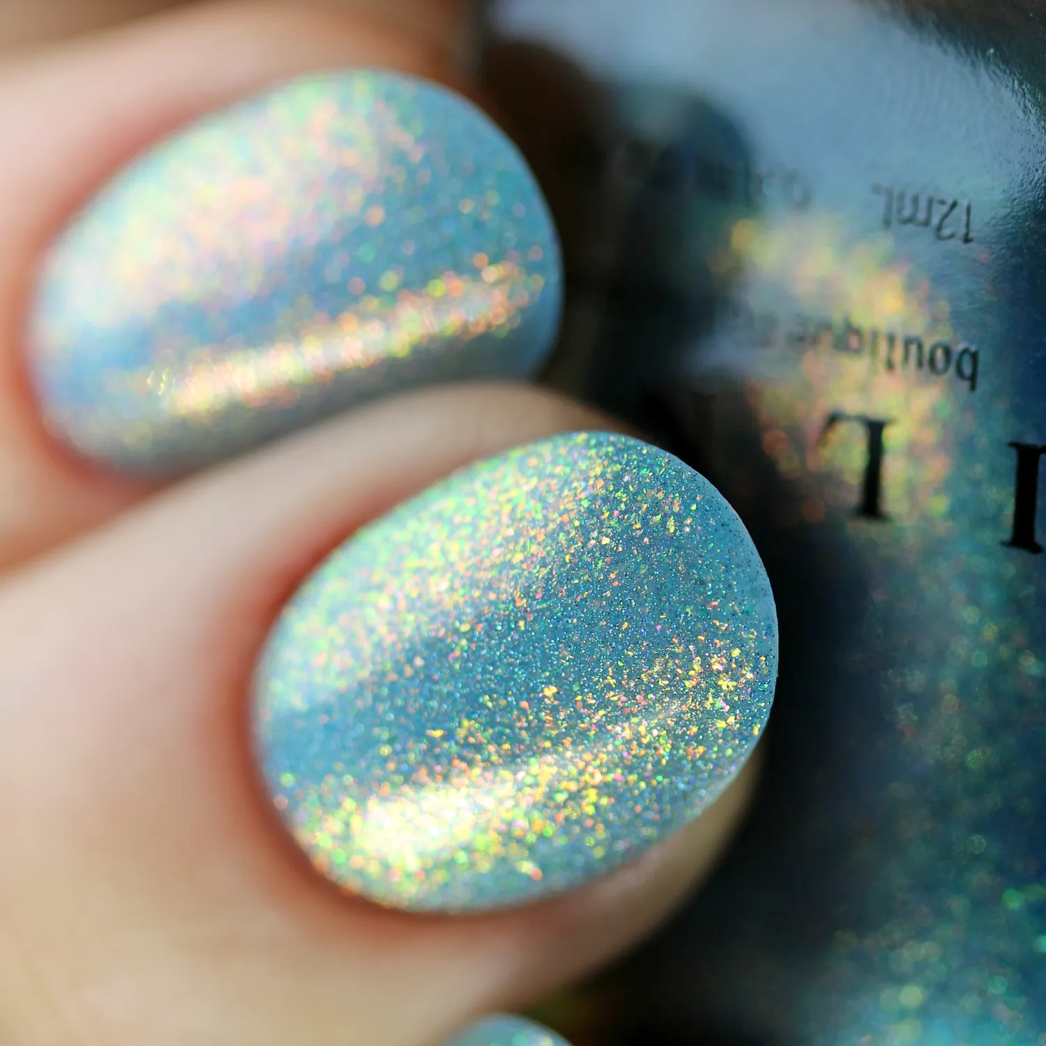 ILNP Skate Date nagellack teal jelly med orange-grönt skimmer