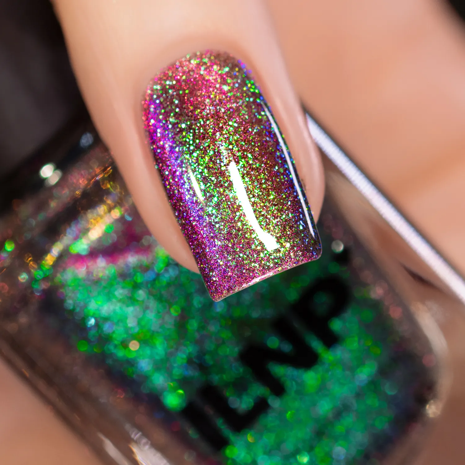 ILNP Illusions Warped magnetnagellack grön-lila