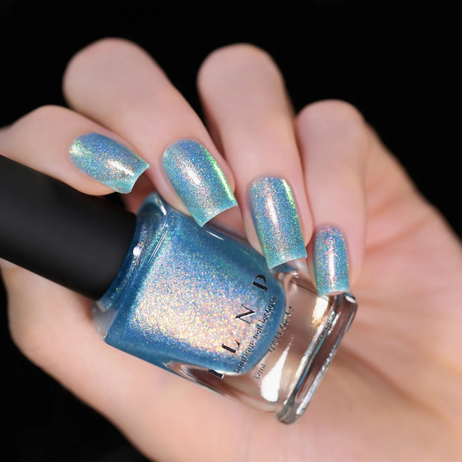 ILNP Skate Date nagellack teal jelly med orange-grönt skimmer