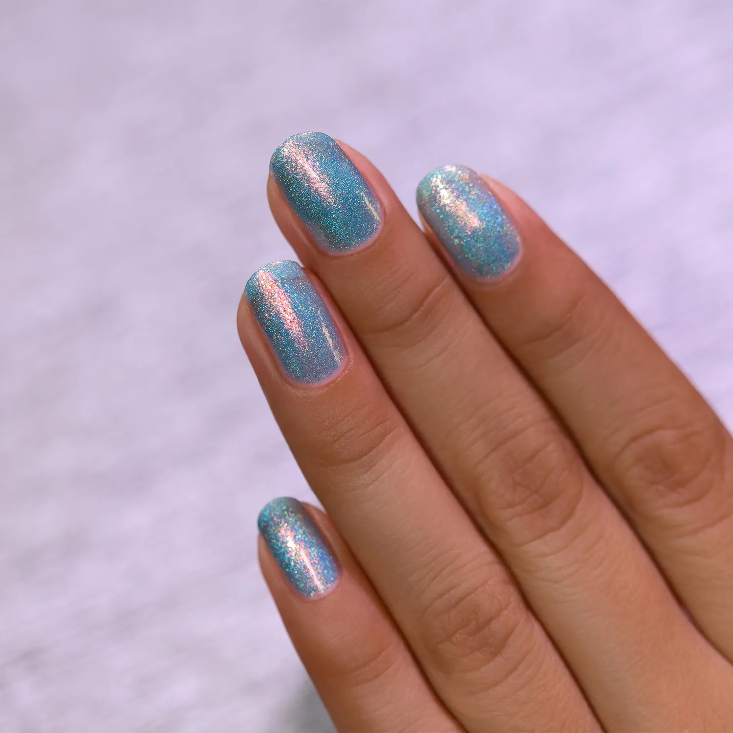 ILNP Skate Date nagellack teal jelly med orange-grönt skimmer