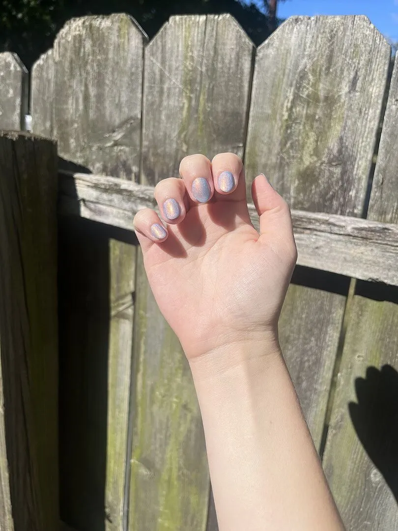 Cirque Colors Hygge nagellack sheer ljusblå kopparskimmer