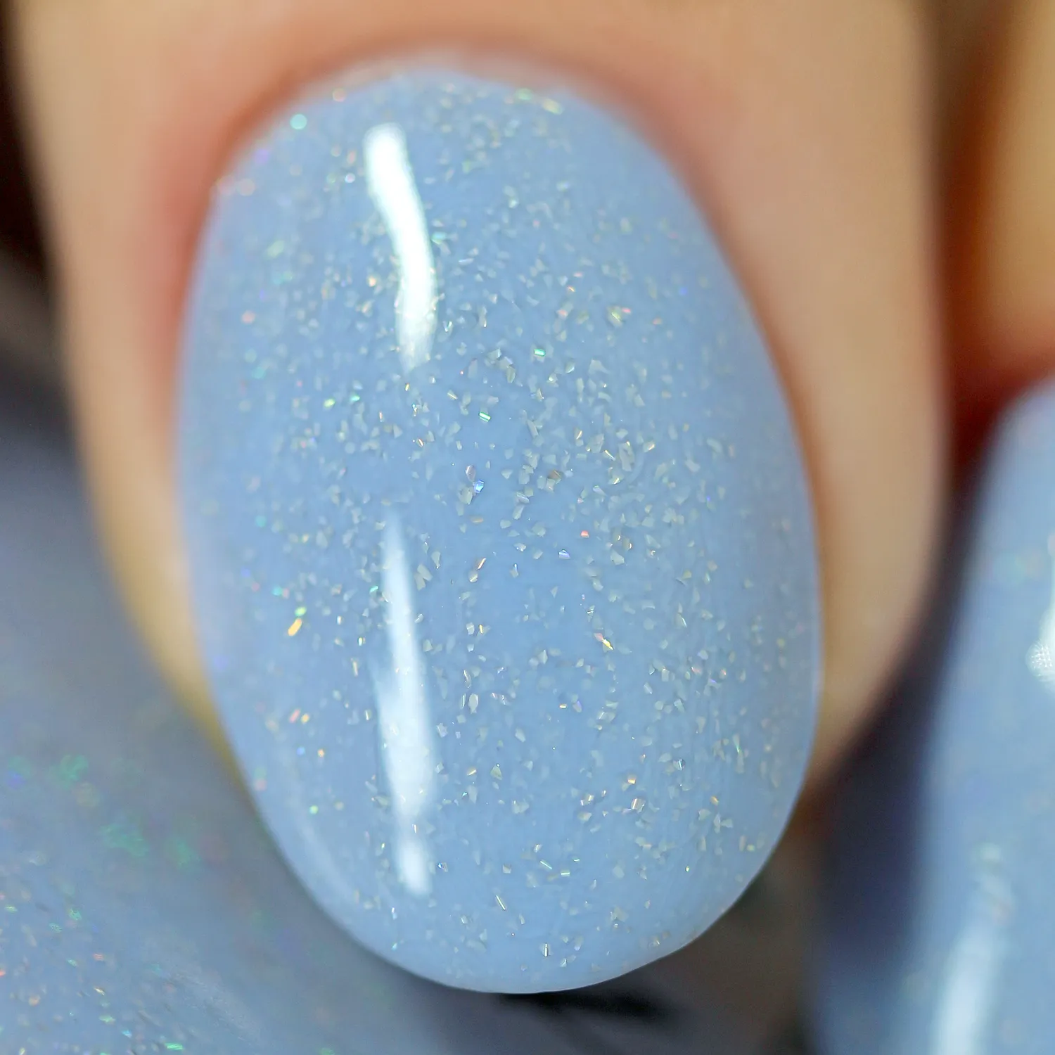 ILNP At Sea Carried Away nagellack duvblå jelly holo