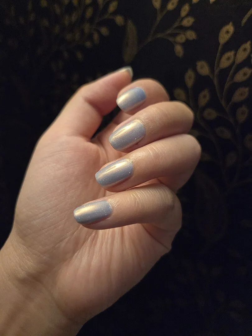 Cirque Colors Hygge nagellack sheer ljusblå kopparskimmer